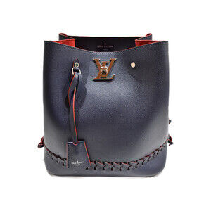 Louis Vuitton Lock Me Bucket Calfskin Leather Shoulder Bag Braided Drawstring